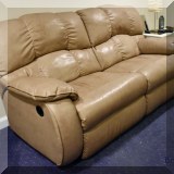 F64. Leather reclining sofa. 40”h x 79”w x 38”d 